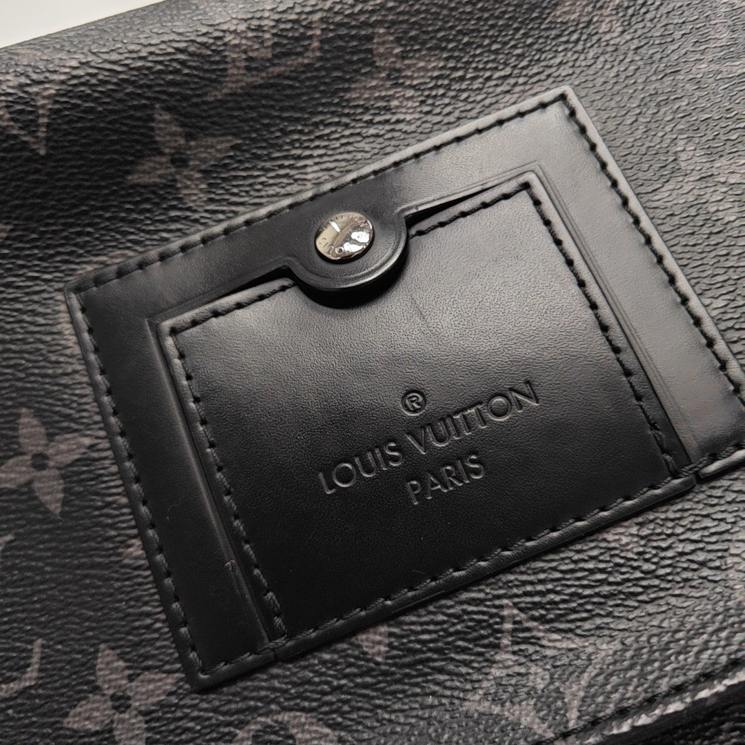 VOYAGER PM Monogram Coated Canvas Black