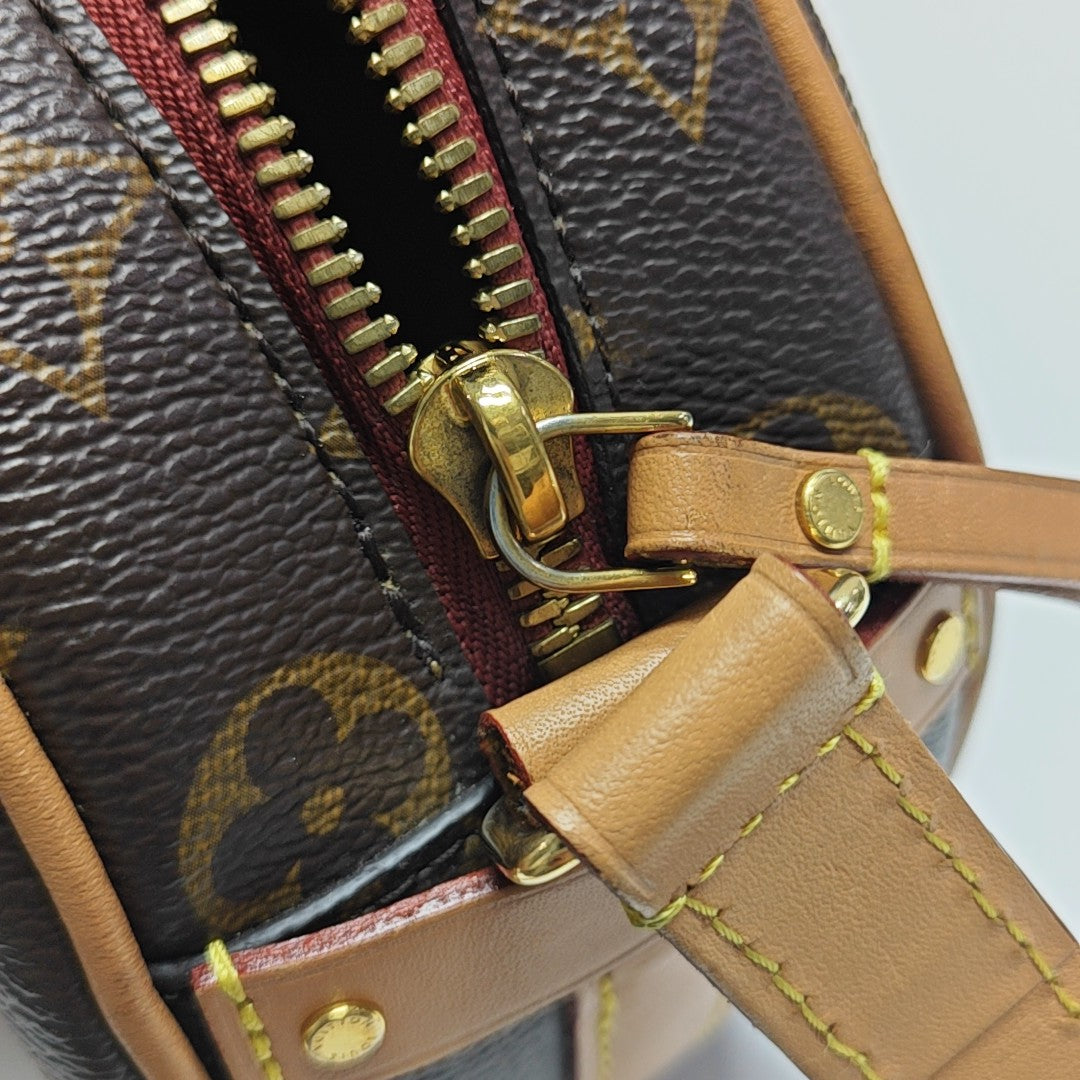 BOITE CHAPEAU PM Monogram Coated Canvas Brown