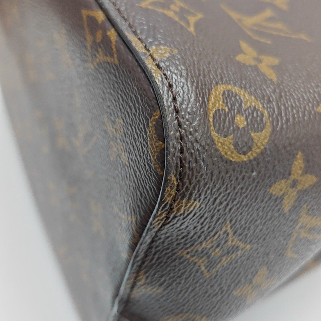 NÉONOÉ MM Monogram Coated Canvas Brown