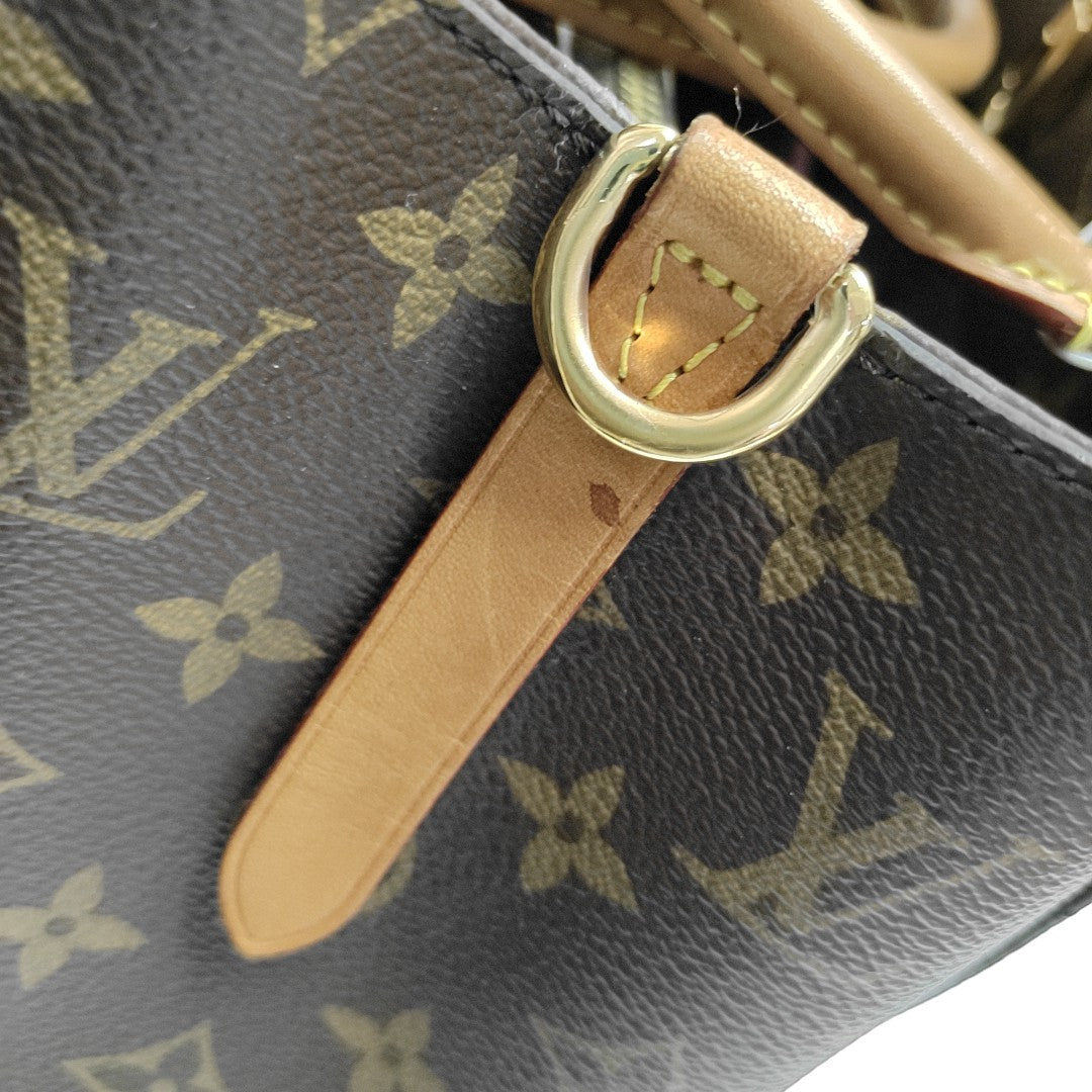 MONTAIGNE GM Monogram Coated Canvas Brown