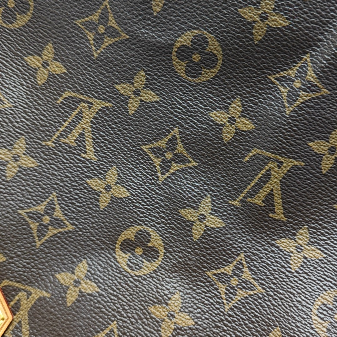 SPEEDY 30 Monogram Coated Canvas Brown