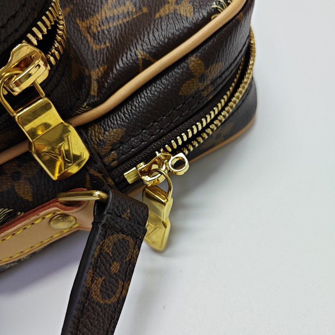 AMAZON Monogram Coated Canvas Brown