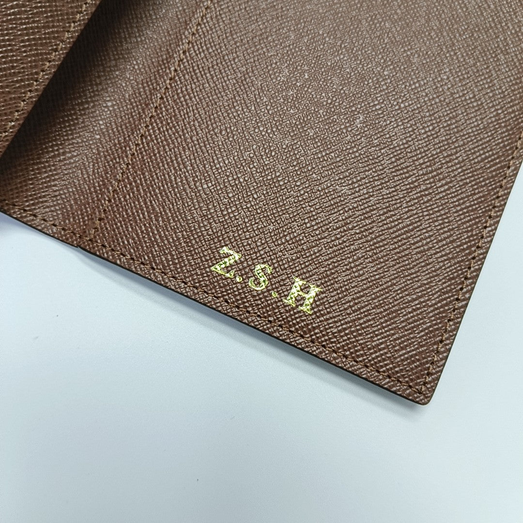 Monogram Coated Canvas Wallet Brown