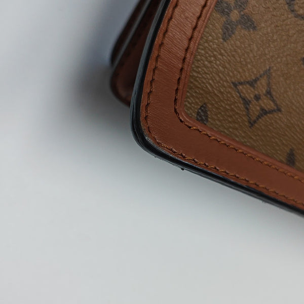 DAUPHINE MM Monogram Coated Canvas Brown