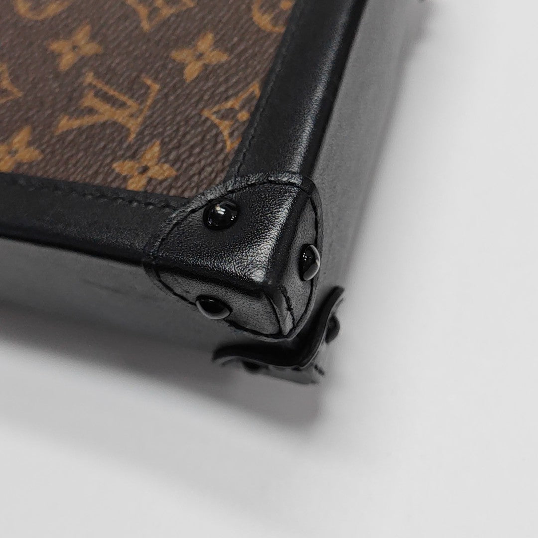 TRUNK Monogram Coated Canvas Brown