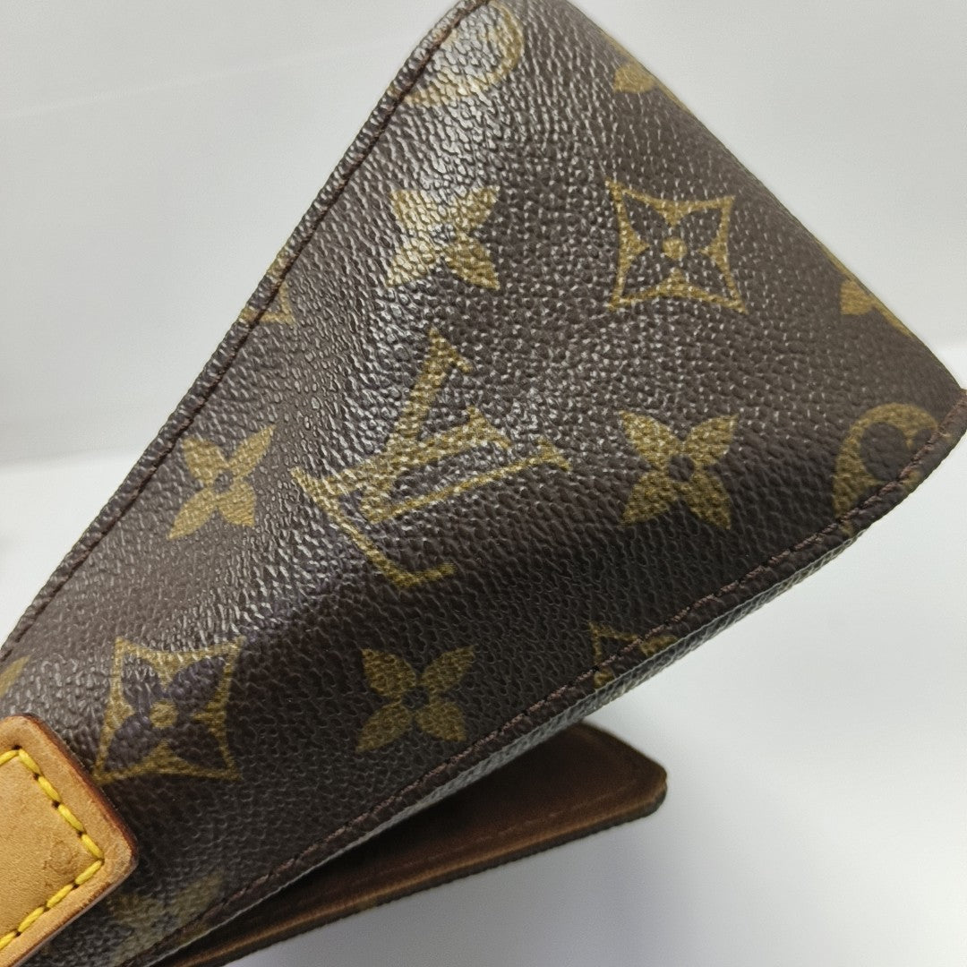 LOOPING PM Monogram Coated Canvas Brown