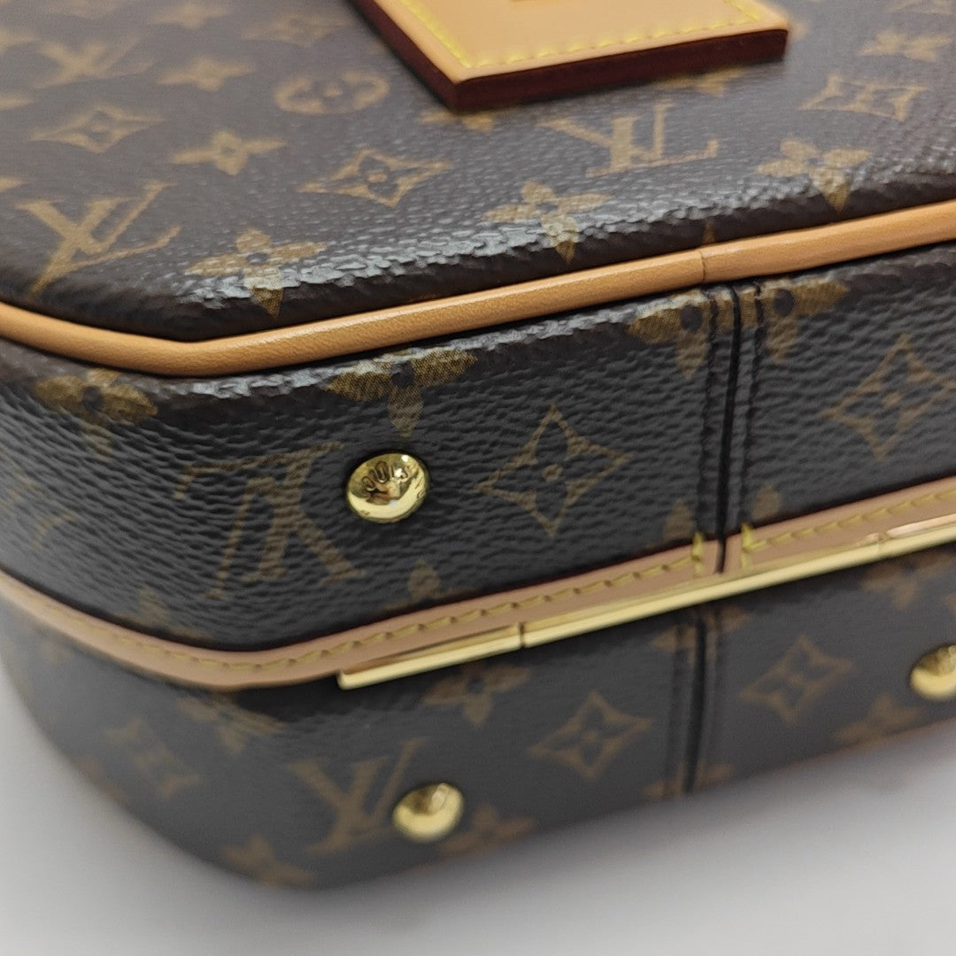 BOITE CHAPEAU PM Monogram Coated Canvas Brown