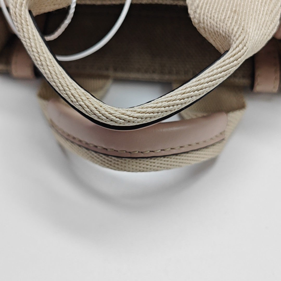 Authenticated pre-owned  Woody Fabric Beige - Shoulder Bag at Looply