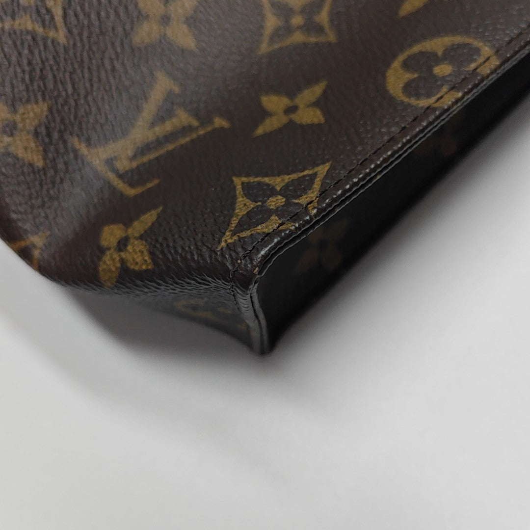 TOILET POCKET 26 Monogram Coated Canvas Brown