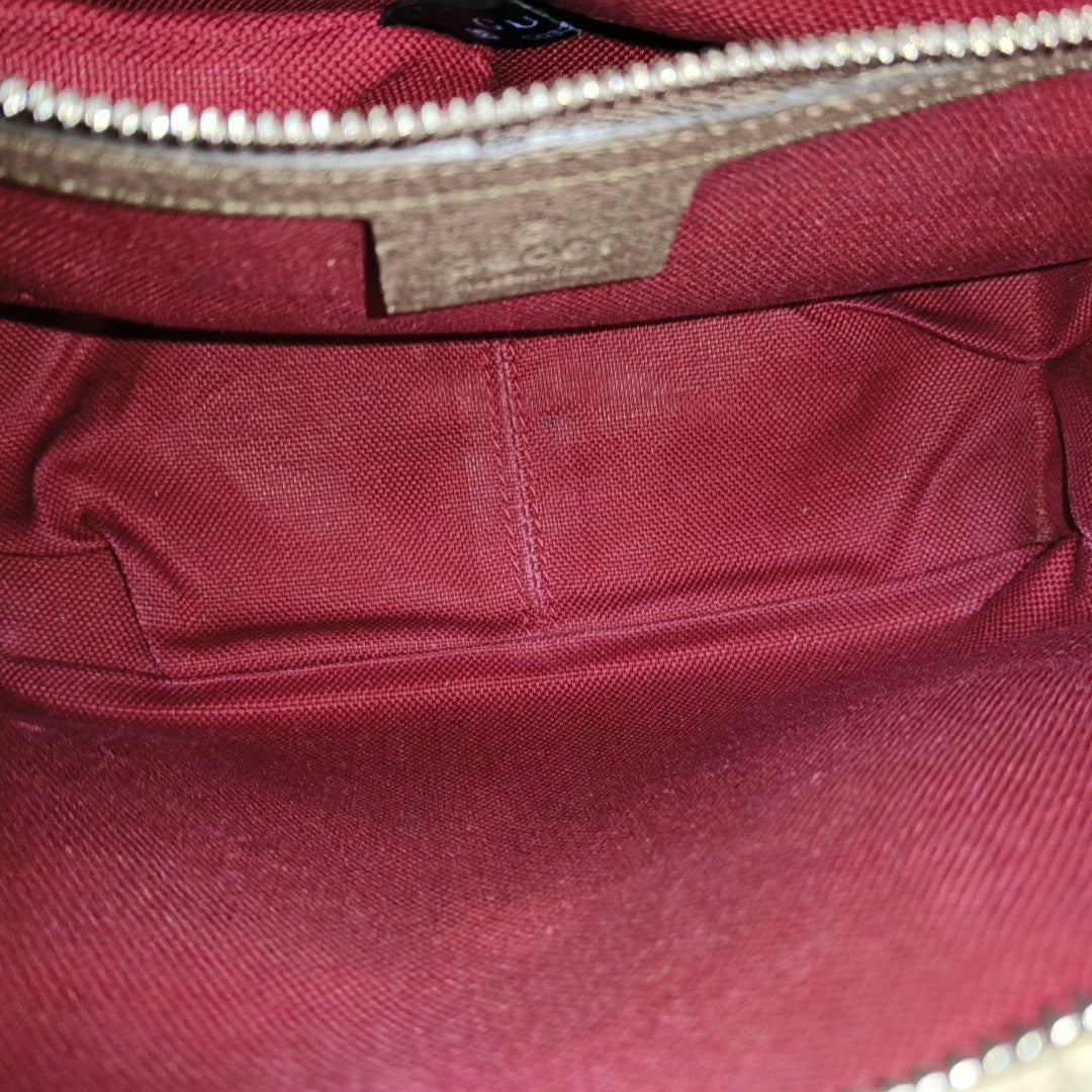 Trunk Monogram Coated Canvas Brown