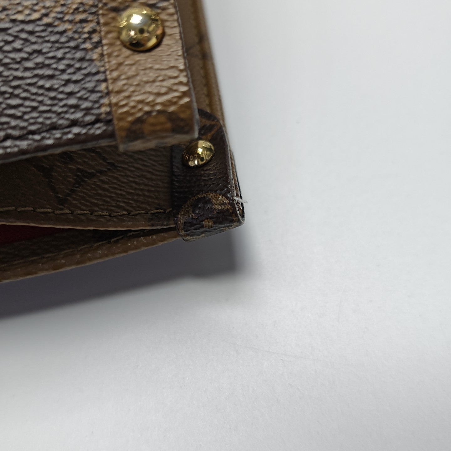 ONTHEGO MM Monogram Coated Canvas Brown