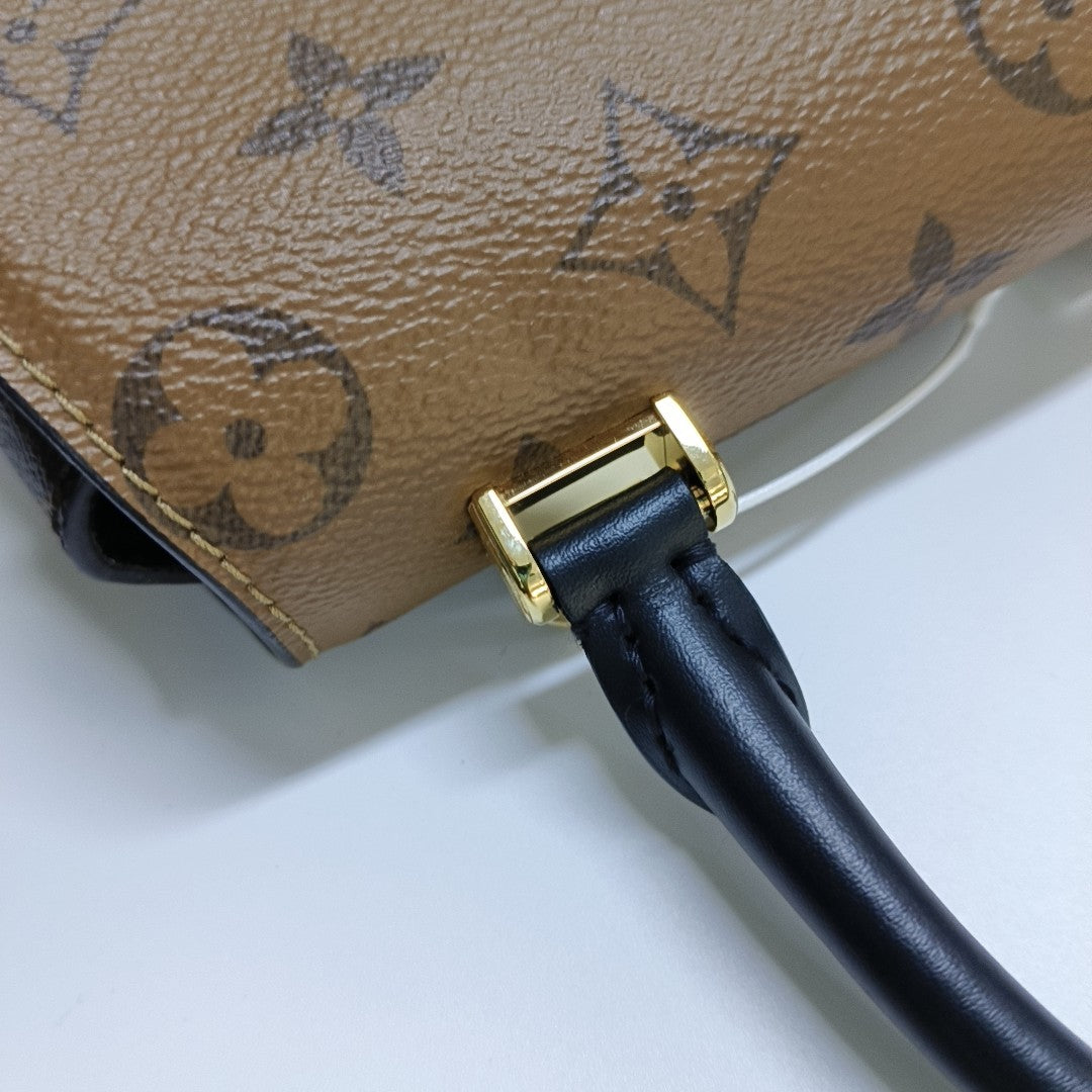EDEN Monogram Coated Canvas Brown