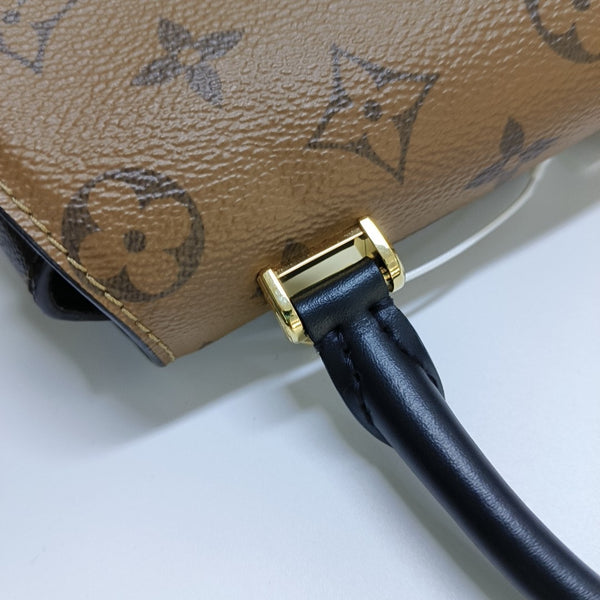 EDEN Monogram Coated Canvas Brown