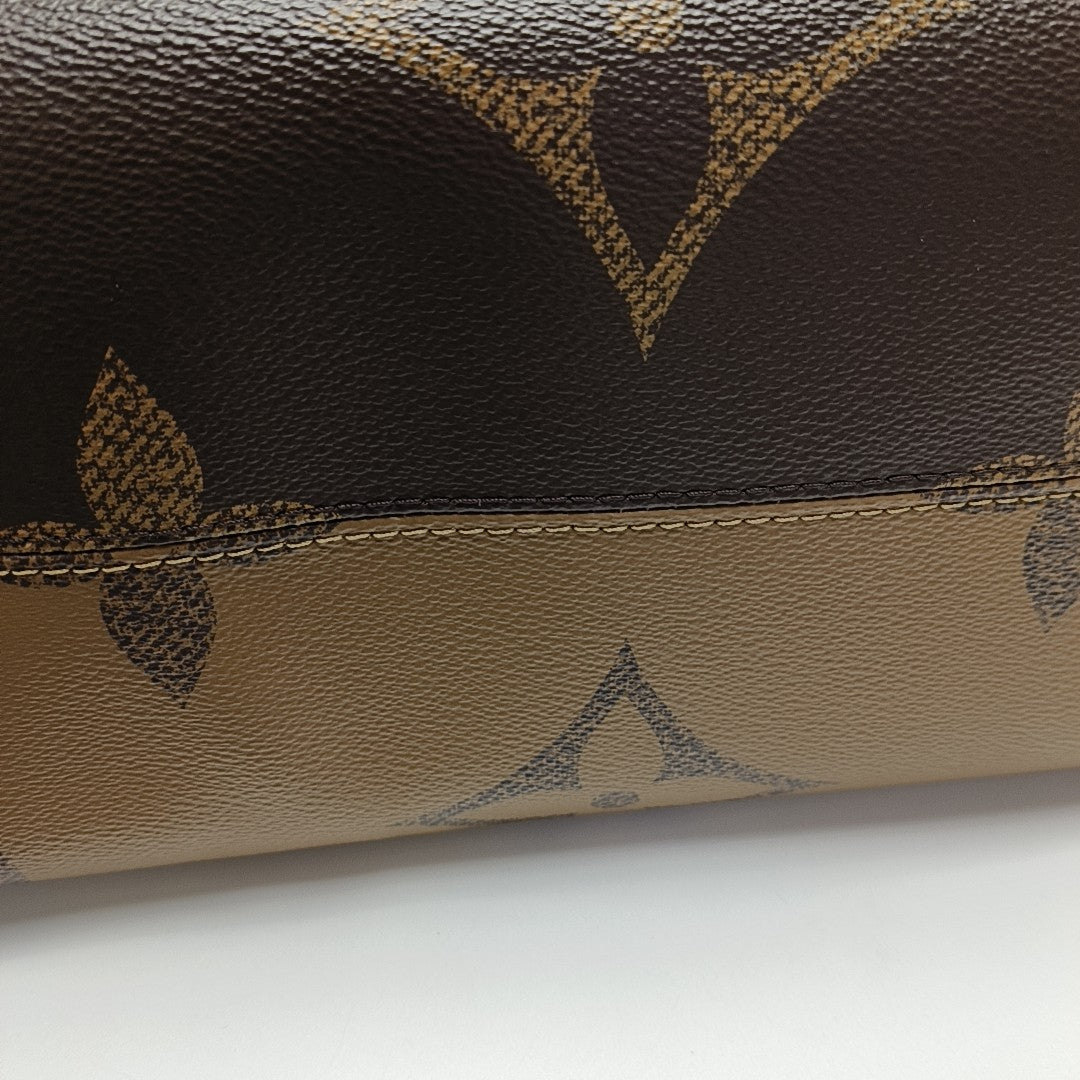 ONTHEGO MM Monogram Coated Canvas Brown