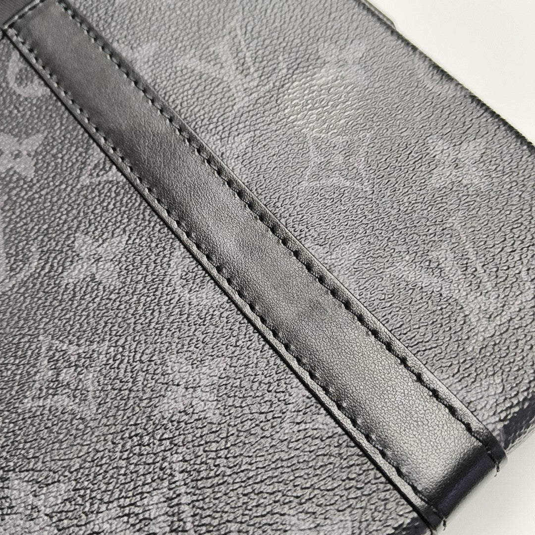 TRUNK PM Monogram Coated Canvas Black