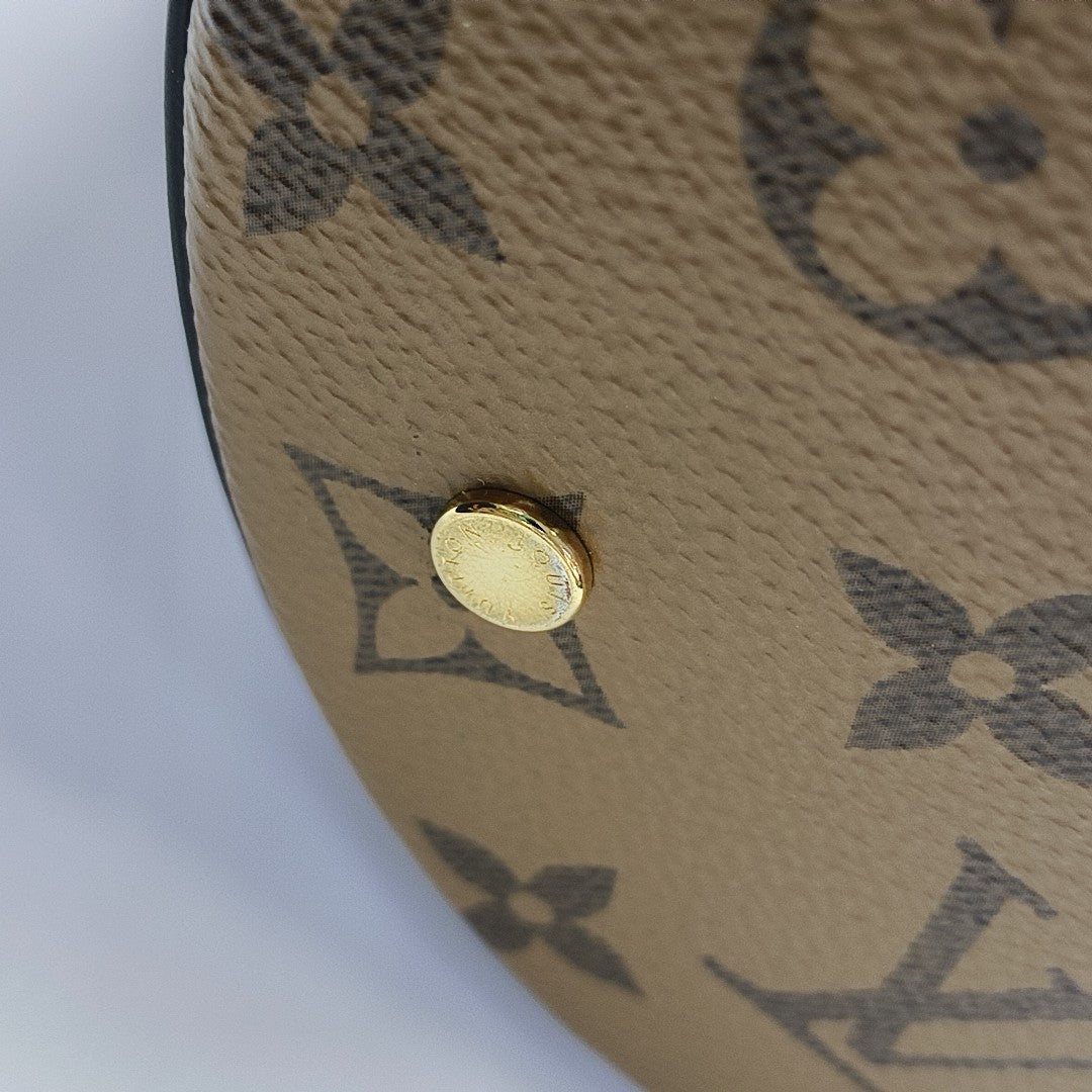 CANNES PM Monogram Coated Canvas Brown