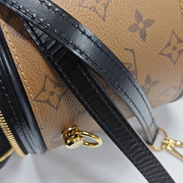 CANNES PM Monogram Coated Canvas Brown