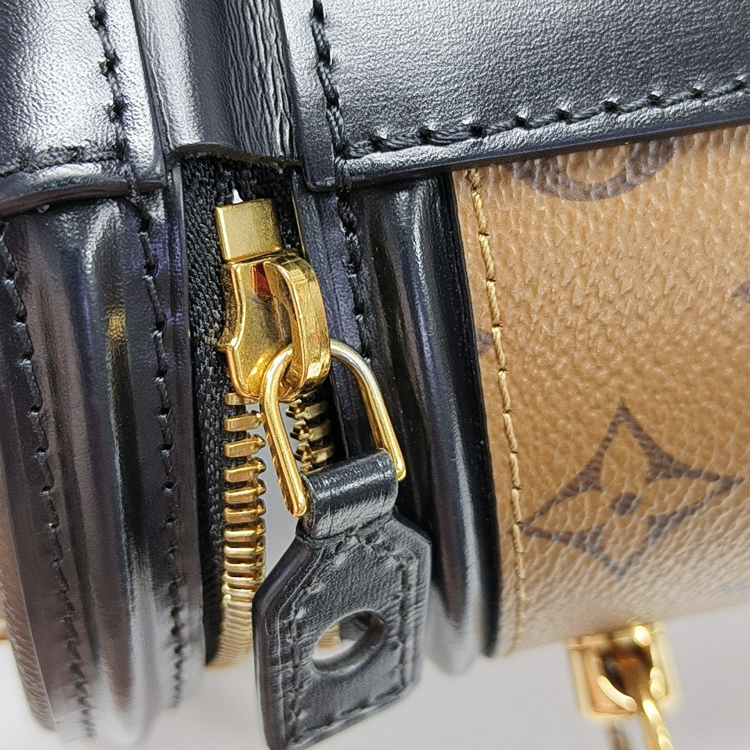 CANNES PM Monogram Coated Canvas Brown