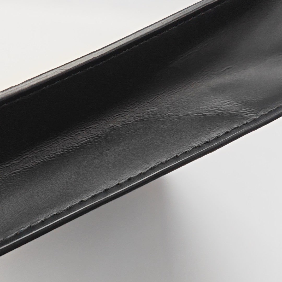 Pochette Voyag MM Monogram Coated Canvas Black