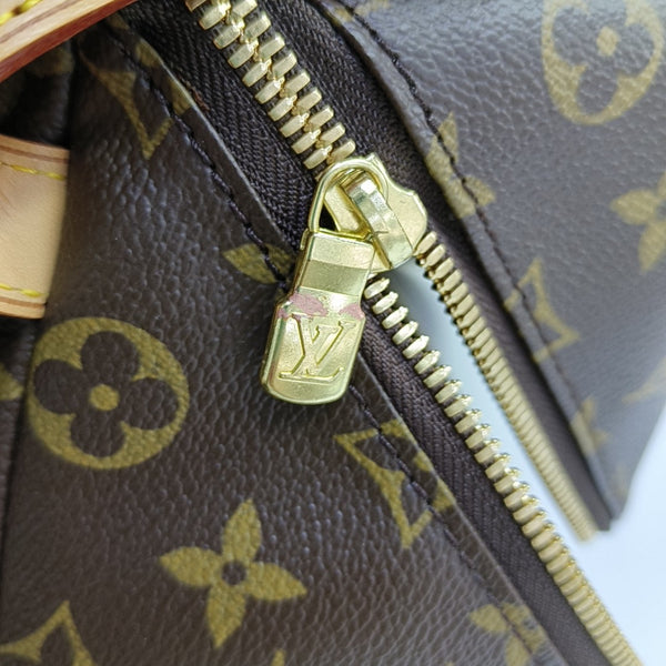 Monogram Coated Canvas Clutch Brown