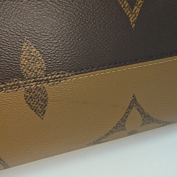 ONTHEGO MM Monogram Coated Canvas Brown