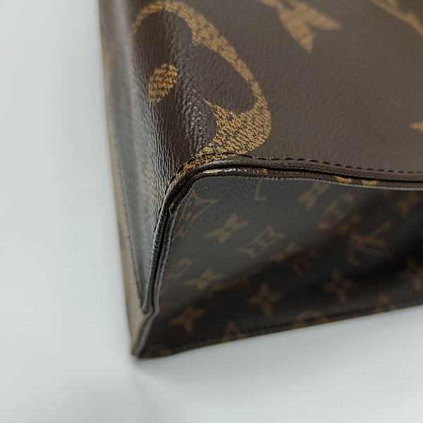ONTHEGO MM Monogram Coated Canvas Brown