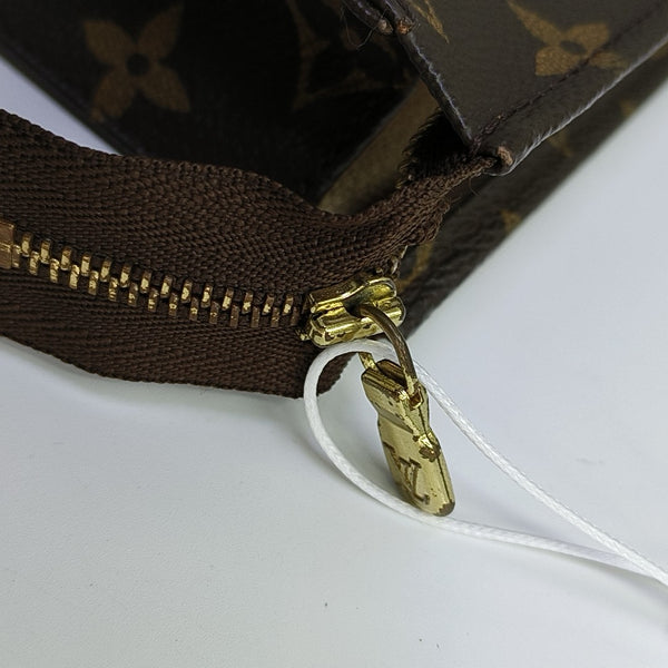 TOILET POCKET 26 Monogram Coated Canvas Brown