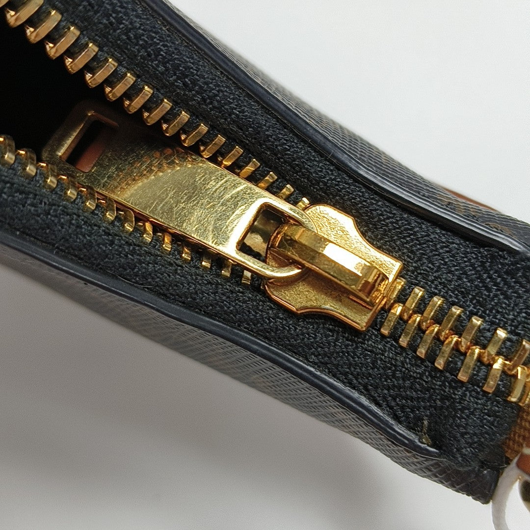 Authenticated pre-owned  AVA Mini Coated Canvas Brown - Top Handle Bag at Looply