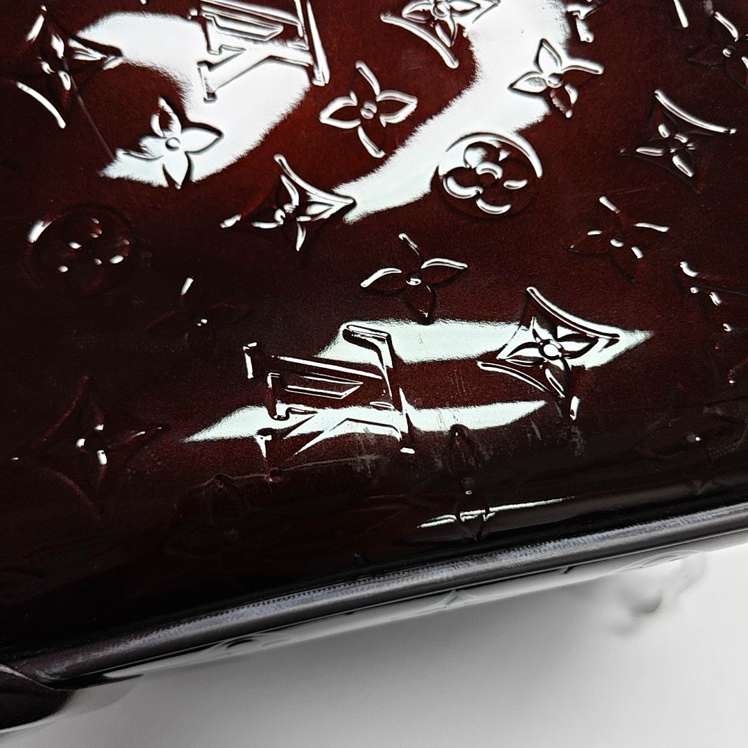 Authenticated pre-owned  PEGASE 45 Patent Leather Burgundy - Luggage at Looply