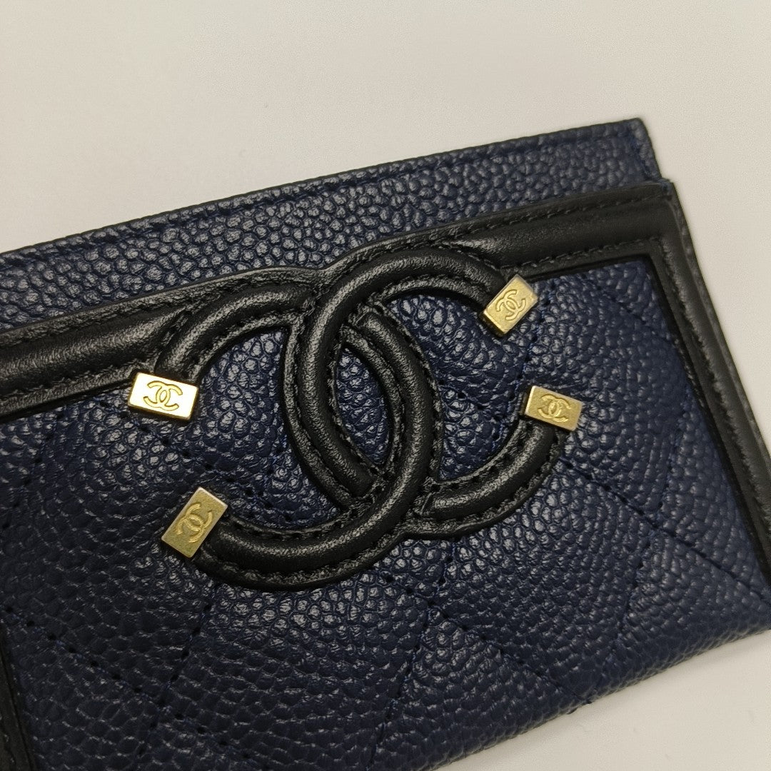 Authenticated pre-owned  FILIGREE Quilted Grained Calfskin Blue Card Holder - Card Holder at Looply