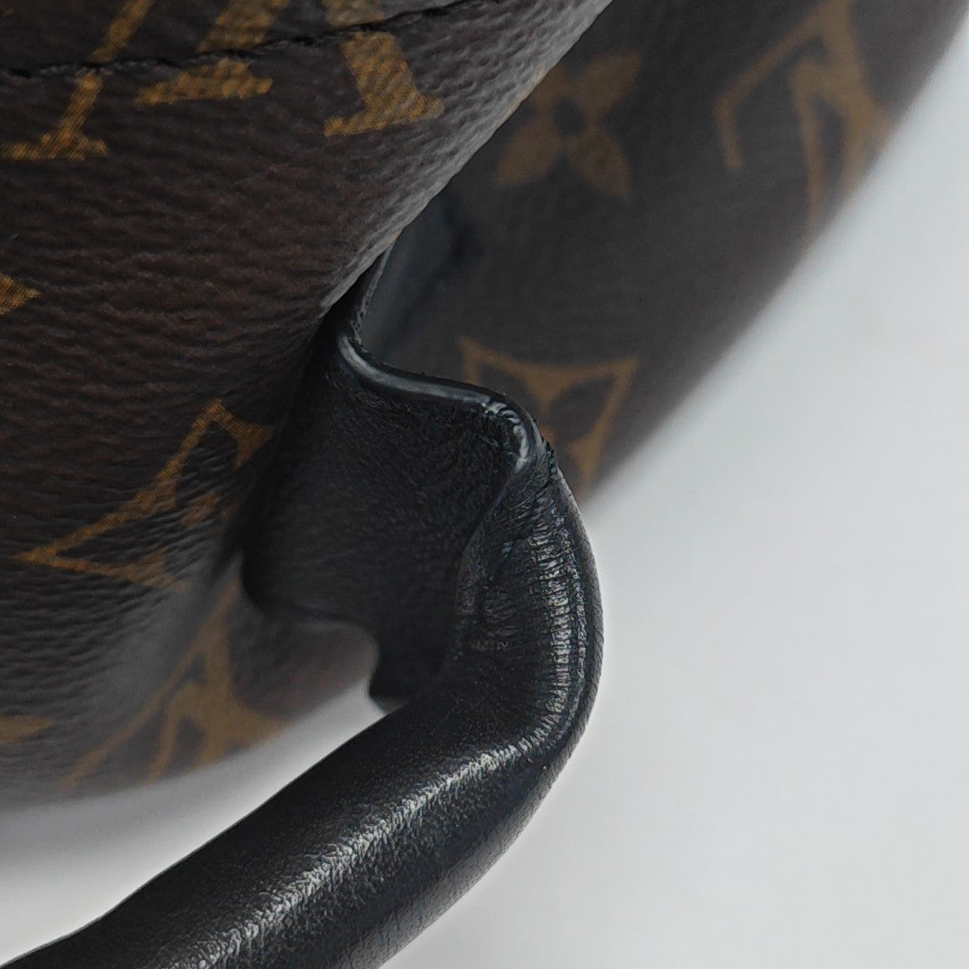 Monogram Coated Canvas Backpack Brown
