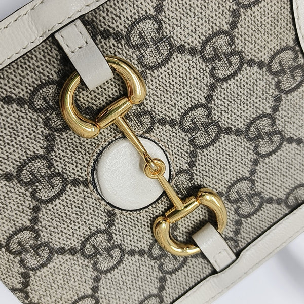 Authenticated pre-owned  Horsebit 1955 Mini Coated Canvas Beige - Shoulder Bag at Looply