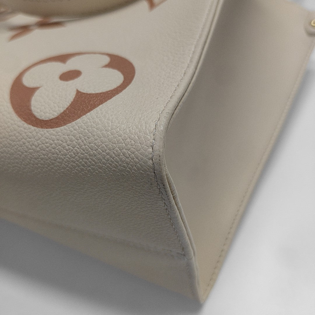 ONTHEGO MM Monogram Calfskin Beige