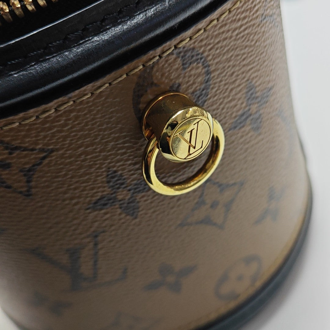 CANNES PM Monogram Coated Canvas Brown