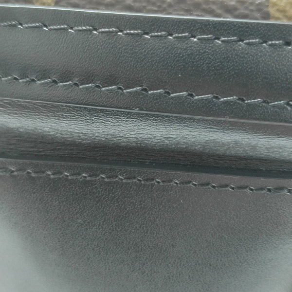 CANNES PM Monogram Coated Canvas Brown