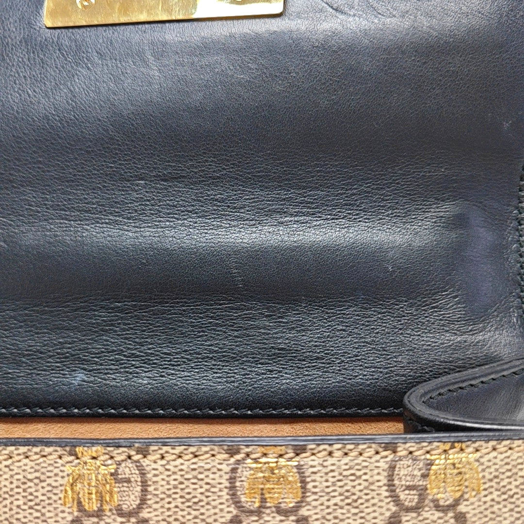 Candado pequeño Monogram lona revestida beige