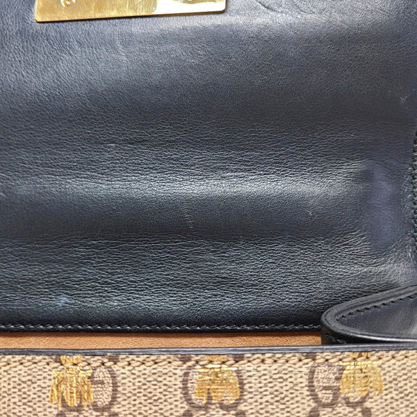Candado pequeño Monogram lona revestida beige