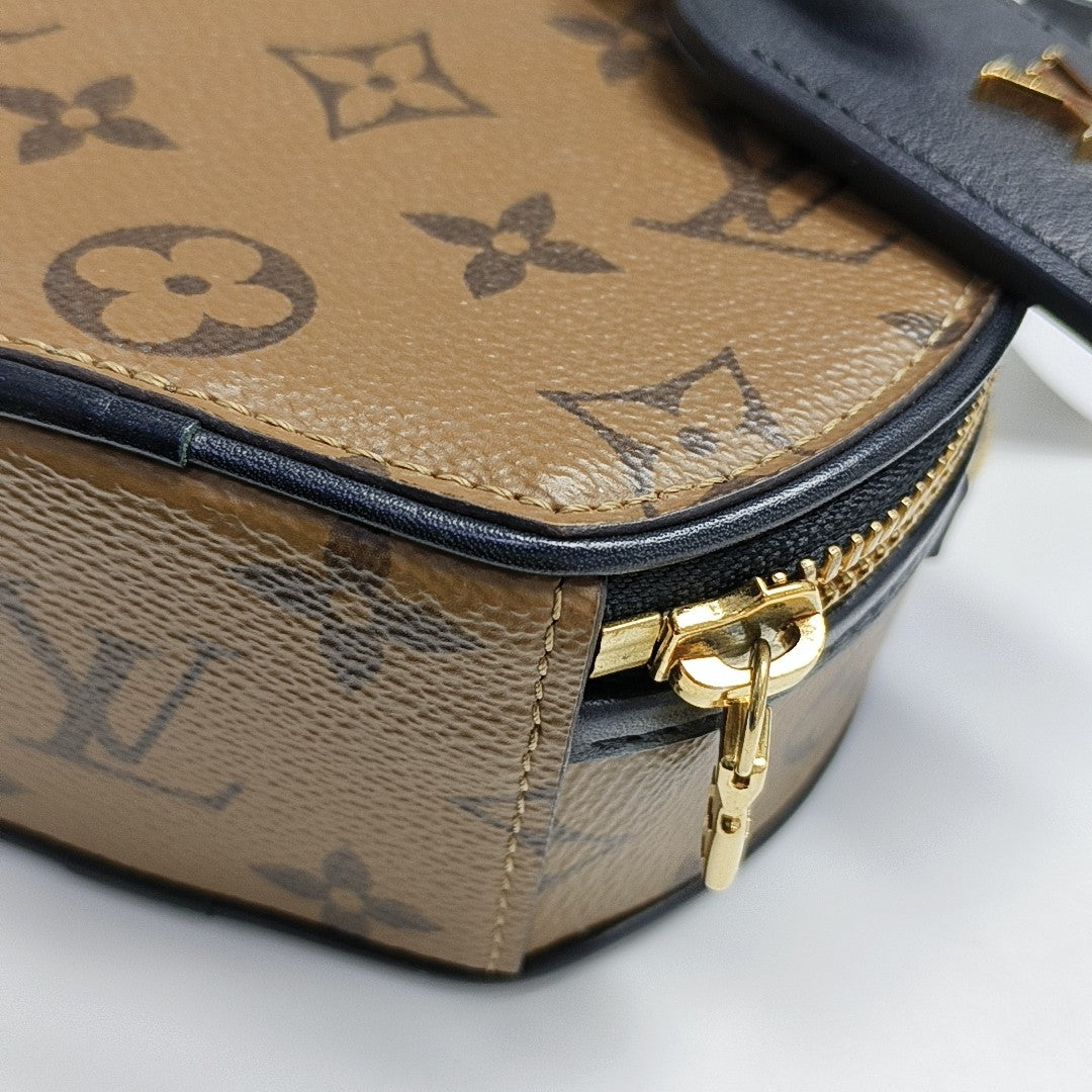 BOITE CHAPEAU Mini Monogram Coated Canvas Brown