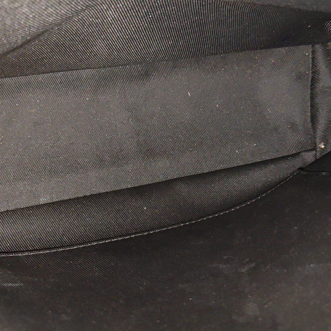 VOYAGER PM Monogram Coated Canvas Black