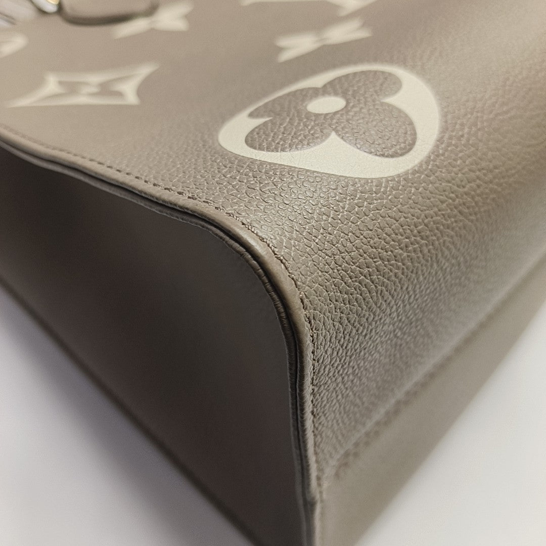 ONTHEGO MM Monogram Calfskin Gray