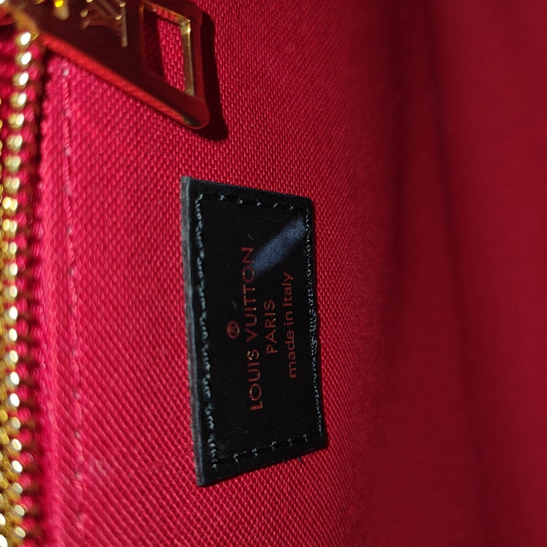ONTHEGO PM Monogram Coated Canvas Brown