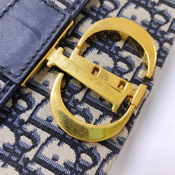 Authenticated pre-owned  30 Montaigne Oblique Canvas Blue - Clutch at Looply