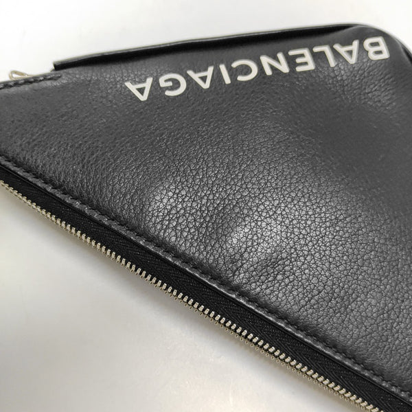 Authenticated pre-owned  Triangle Calfskin Black - Clutch at Looply