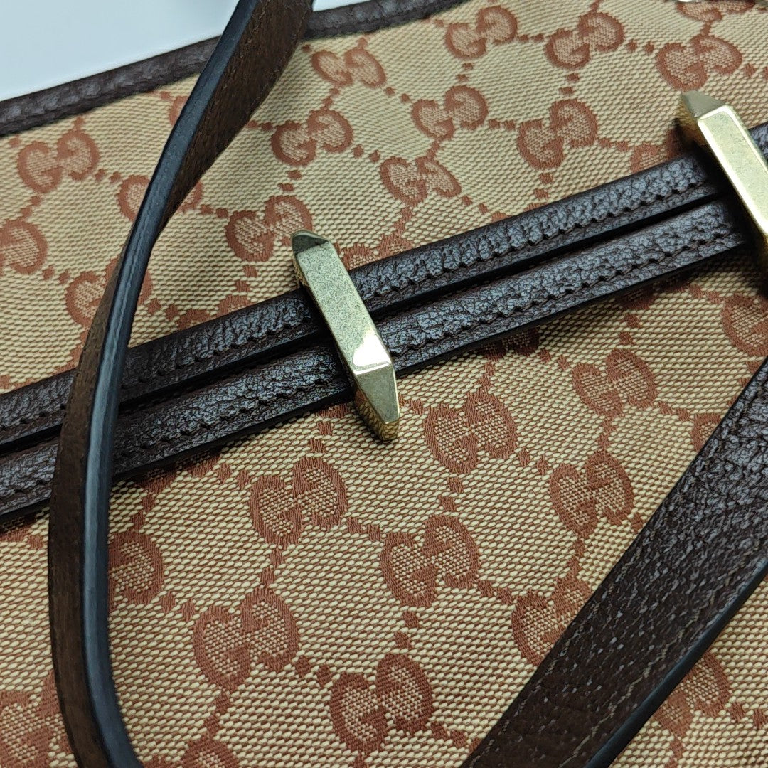 Authenticated pre-owned  Horsebit Chain Monogram Canvas Brown - Shoulder Bag at Looply