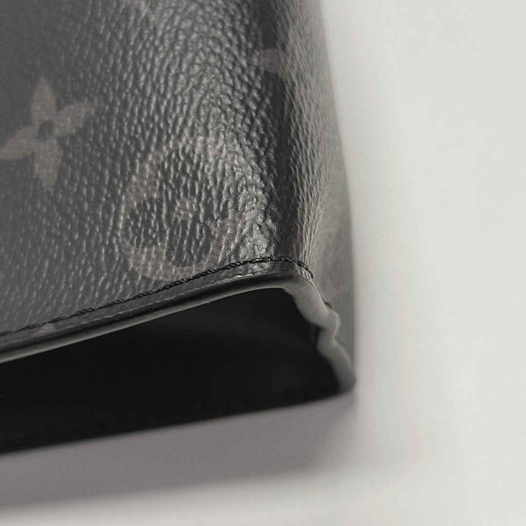 Pochette Voyag MM Monogram Coated Canvas Black