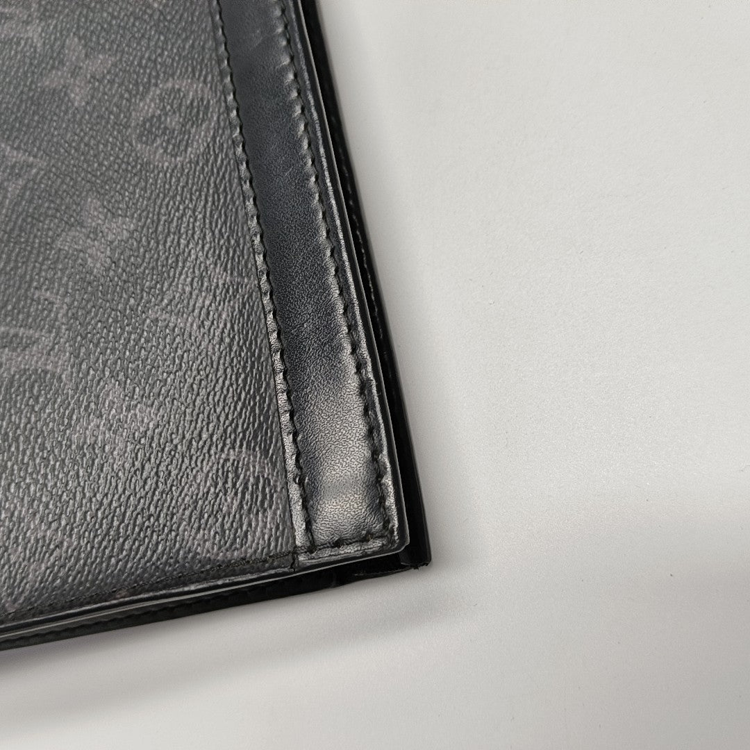 Pochette Voyag MM Monogram Coated Canvas Black
