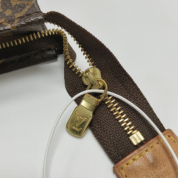 TOILET POCKET 19 Monogram Coated Canvas Brown