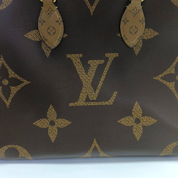 ONTHEGO MM Monogram Coated Canvas Brown