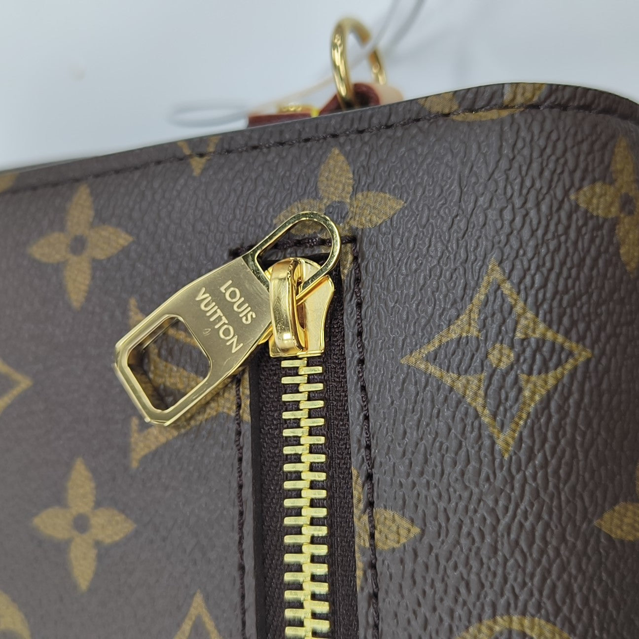 MÉTIS MM Monogram Coated Canvas Brown