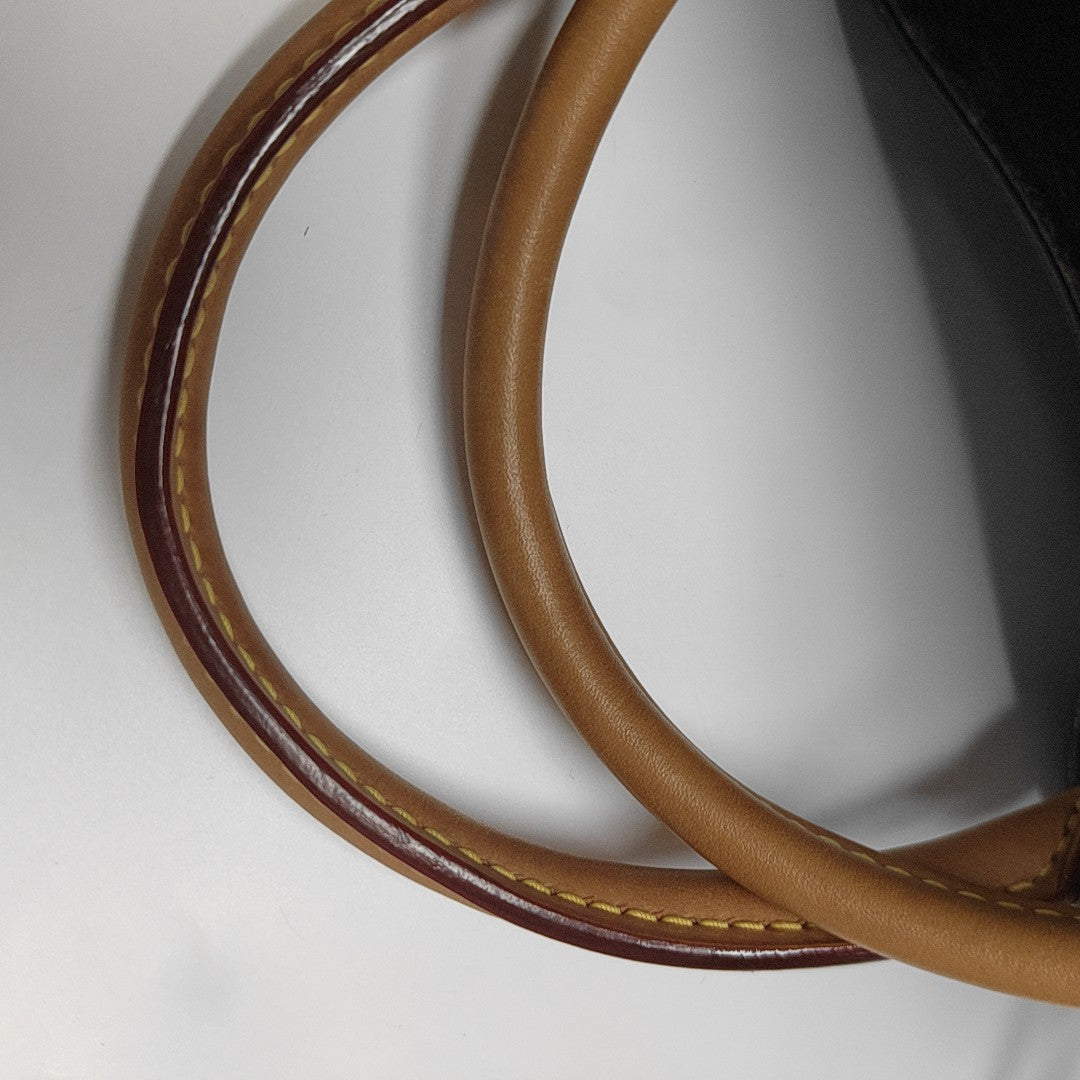 MONTAIGNE Monogram Coated Canvas Brown